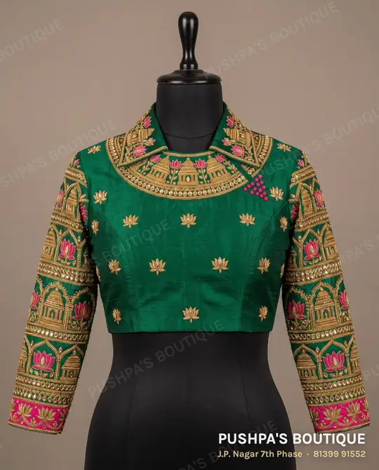 Emerald-green 4 dot blouse with a kundan and zari neckline, lotus buttas and temple borders on full sleeves